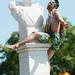 EMU grad and Ypsilanti resident Matthew Weitzel sings as he hangs off of a statue during a taping for the Pure Michigan video in Ypsilanti on Wednesday. Melanie Maxwell I AnnArbor.com
